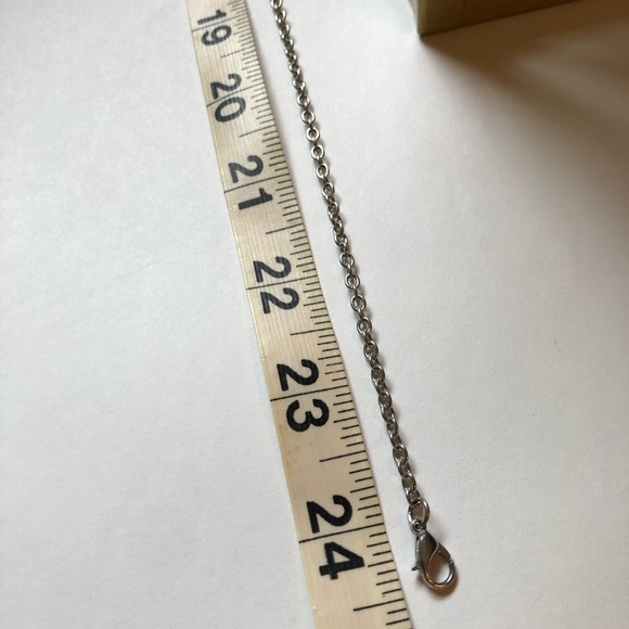 ❗️3/$7 Silver jeweled ribbon necklace - Picture 2 of 2